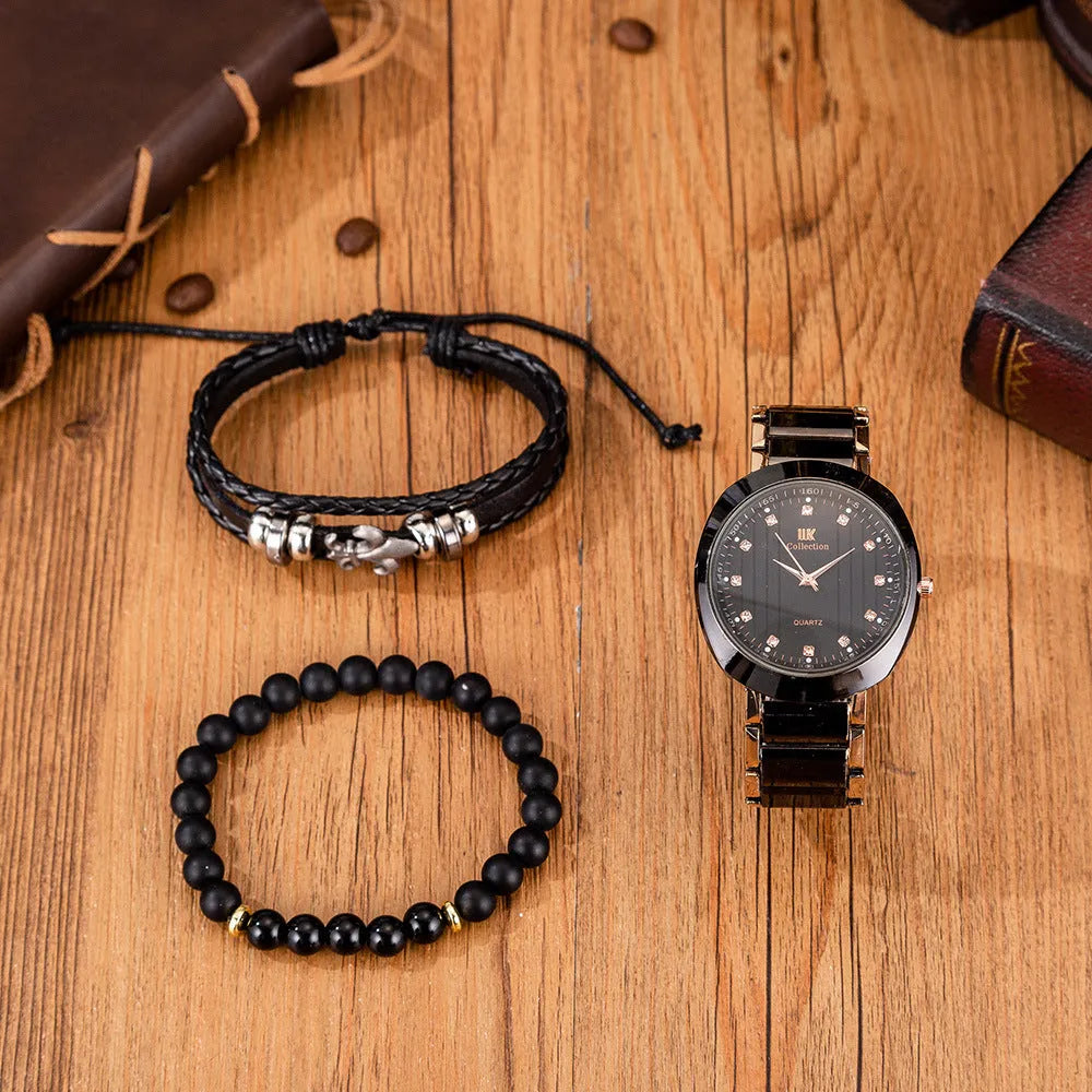 Men's black quartz watch with steel band, pointer display, and chronograph detail