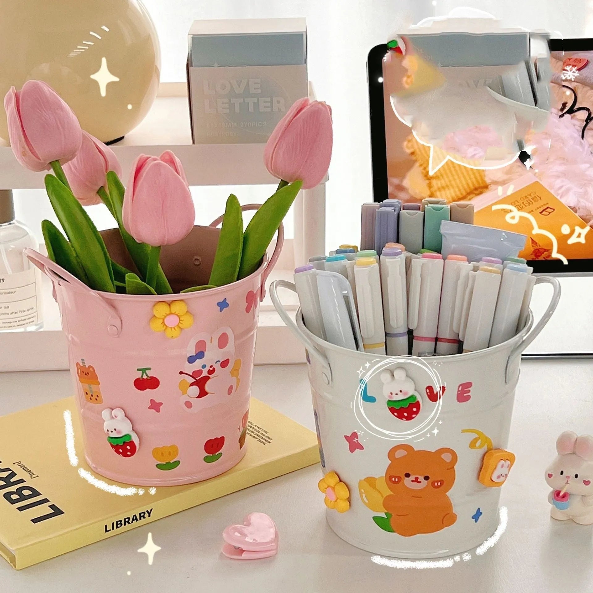 Round metal desktop pen holder in a choice of colours including pink, green, and yellow.
