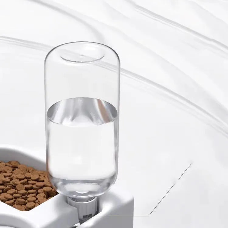 White food-grade silicone pet water fountain with pump and filter on a kitchen floor.