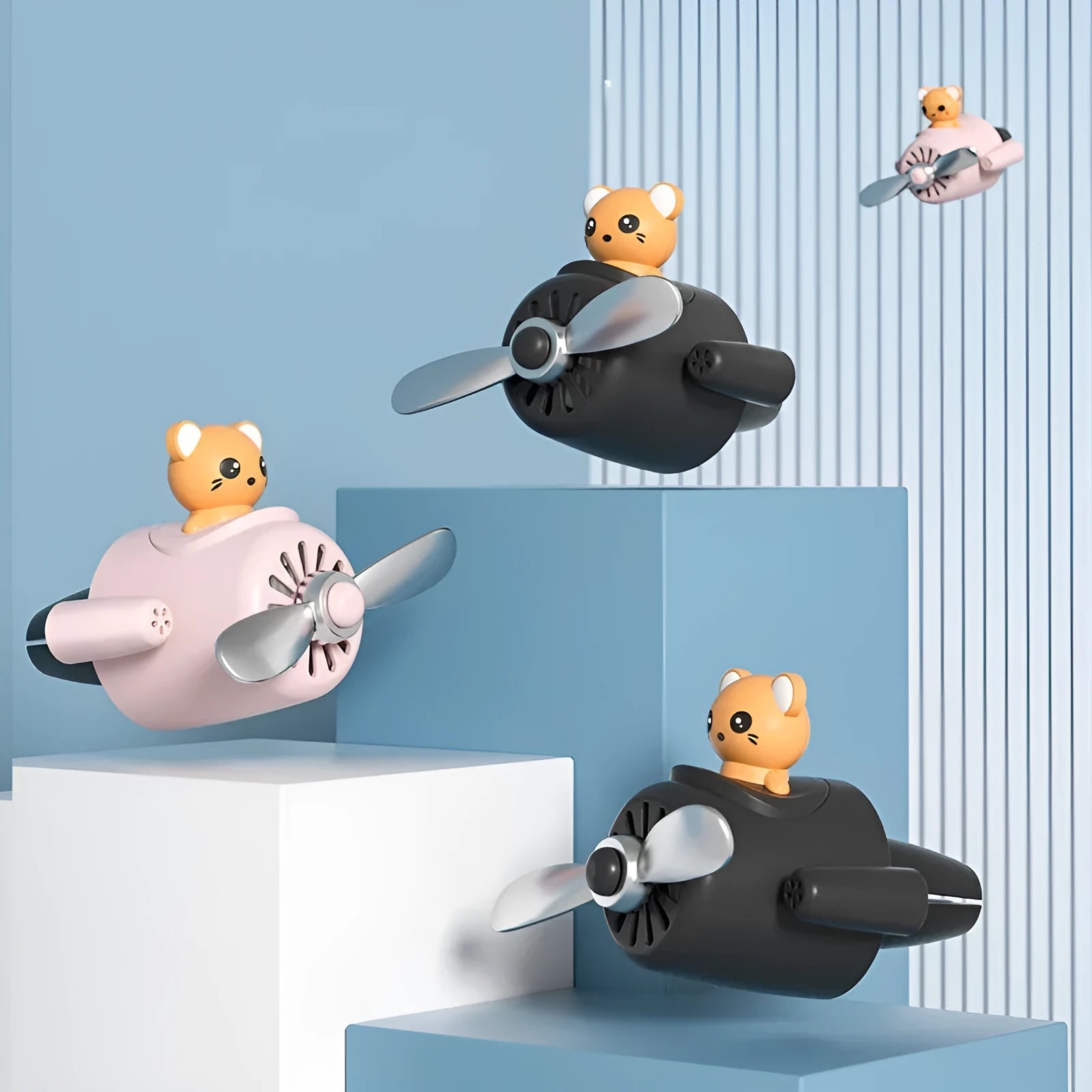 Cartoon aeroplane-shaped plastic clip for car air vent with three fragrant slices.