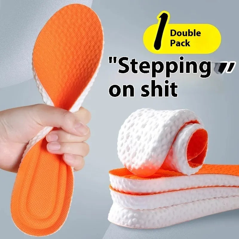 A pair of grey breathable sports insoles made of soft PU material, shown alongside scissors to illustrate the trimmable feature.