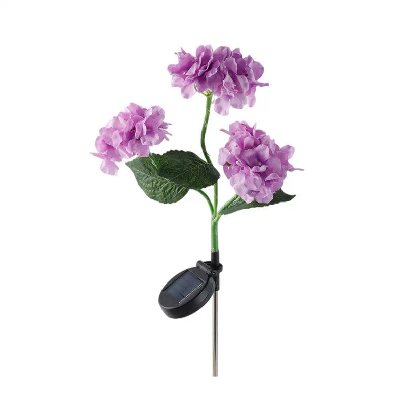 Solar hydrangea garden decorative light in garden setting with floor outlet placement