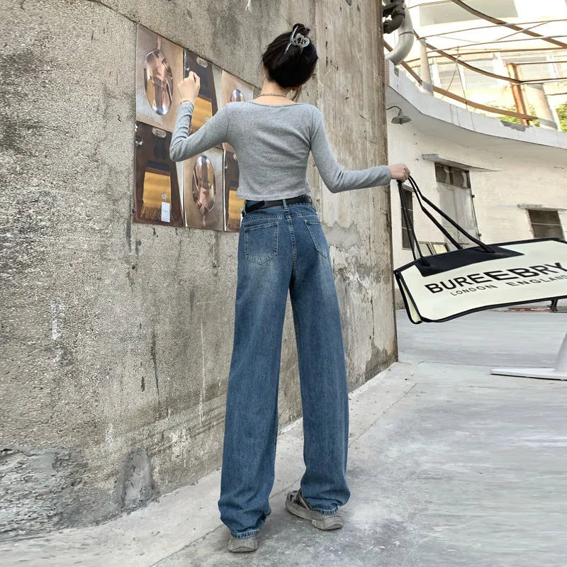 Women's high-waisted retro blue straight-leg jeans in 100% cotton denim laid flat.