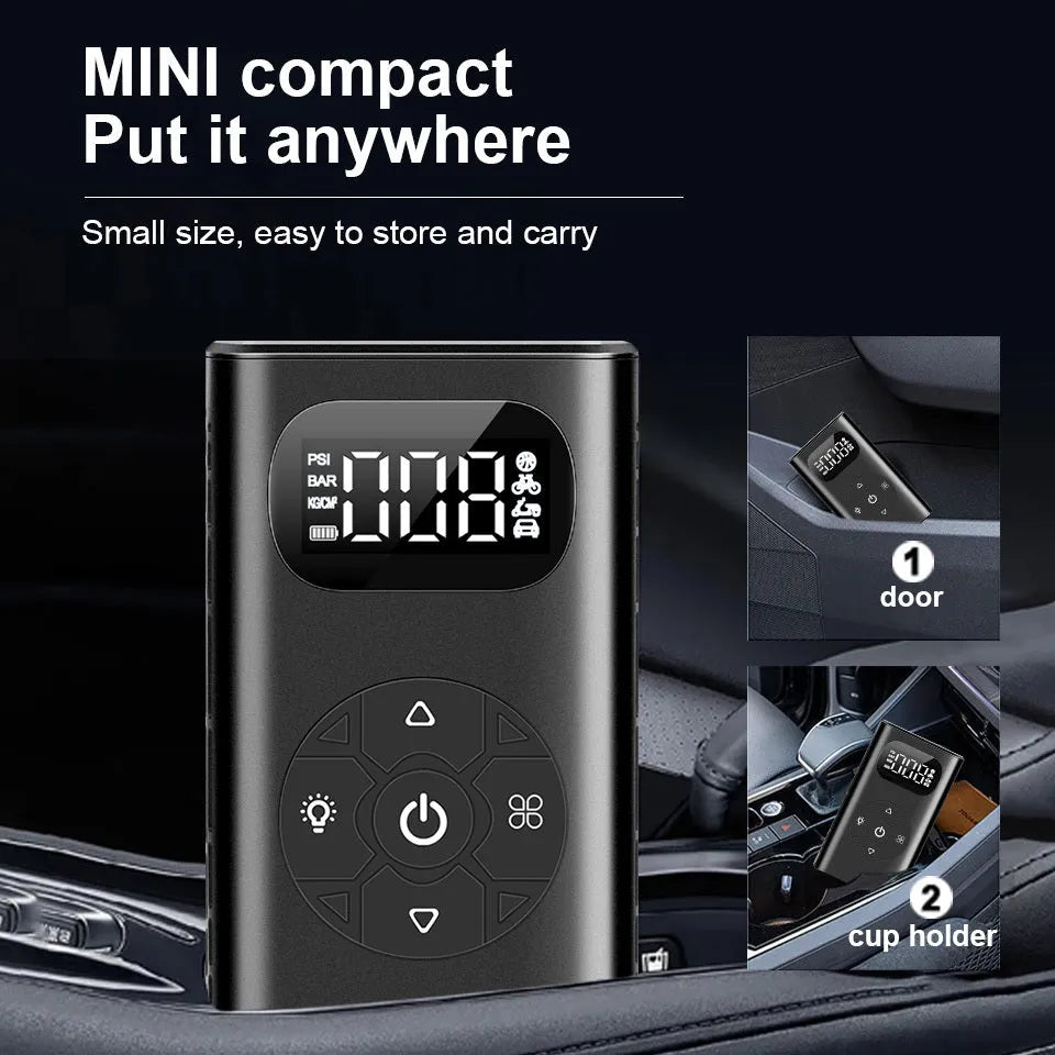 Black rectangular portable tyre inflator and power bank unit with a connected inflation hose on a table.