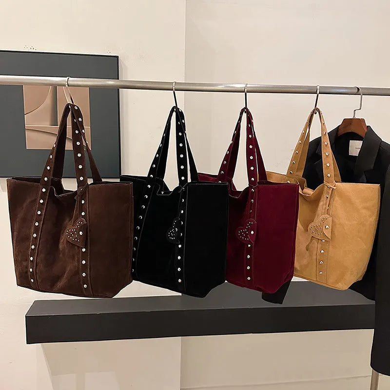 PU tote bag with double shoulder straps in black showing horizontal square shape and sandwich pocket exterior
