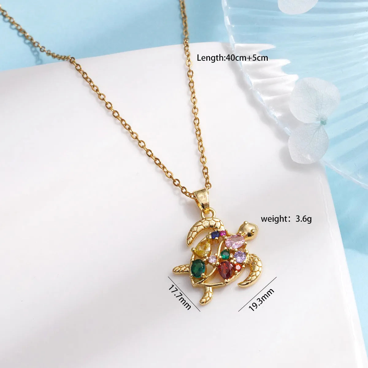 Gold-plated copper sea turtle necklace with zirconium accents and mixed gemstone inlay, O-link chain, light luxury style for women