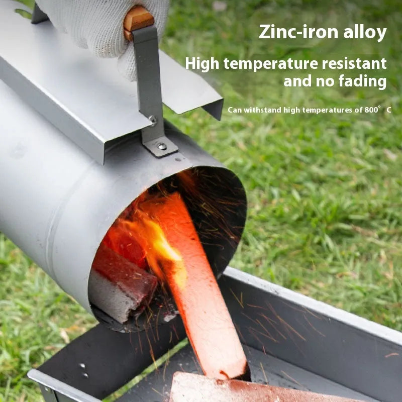 Zinc-iron alloy charcoal barbecue oven igniter with pointed carbon barrel design on a garden table.