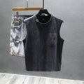 Women's loose fit cotton sleeveless vest in white on a hanger, showing straight hem and solid colour.