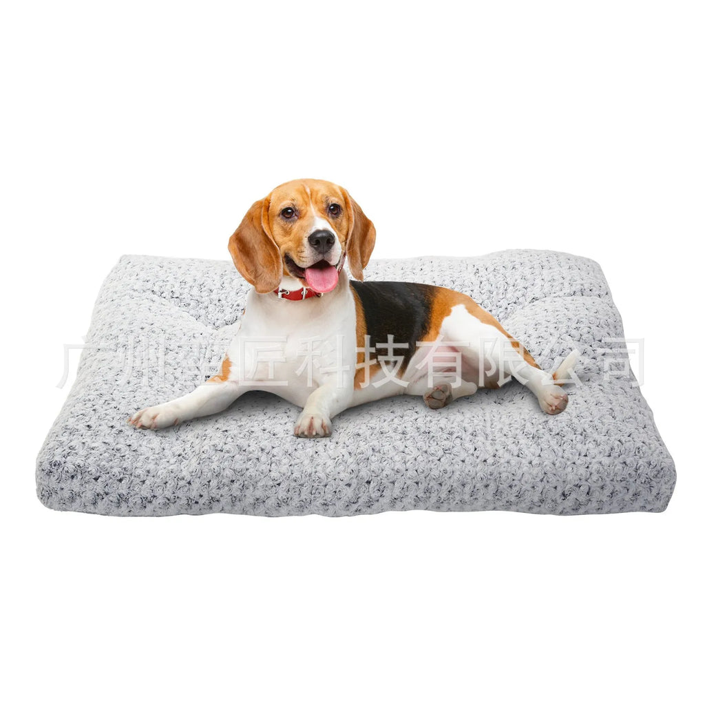 Light gray embossed velvet dog bed for small to large pets on a wooden floor