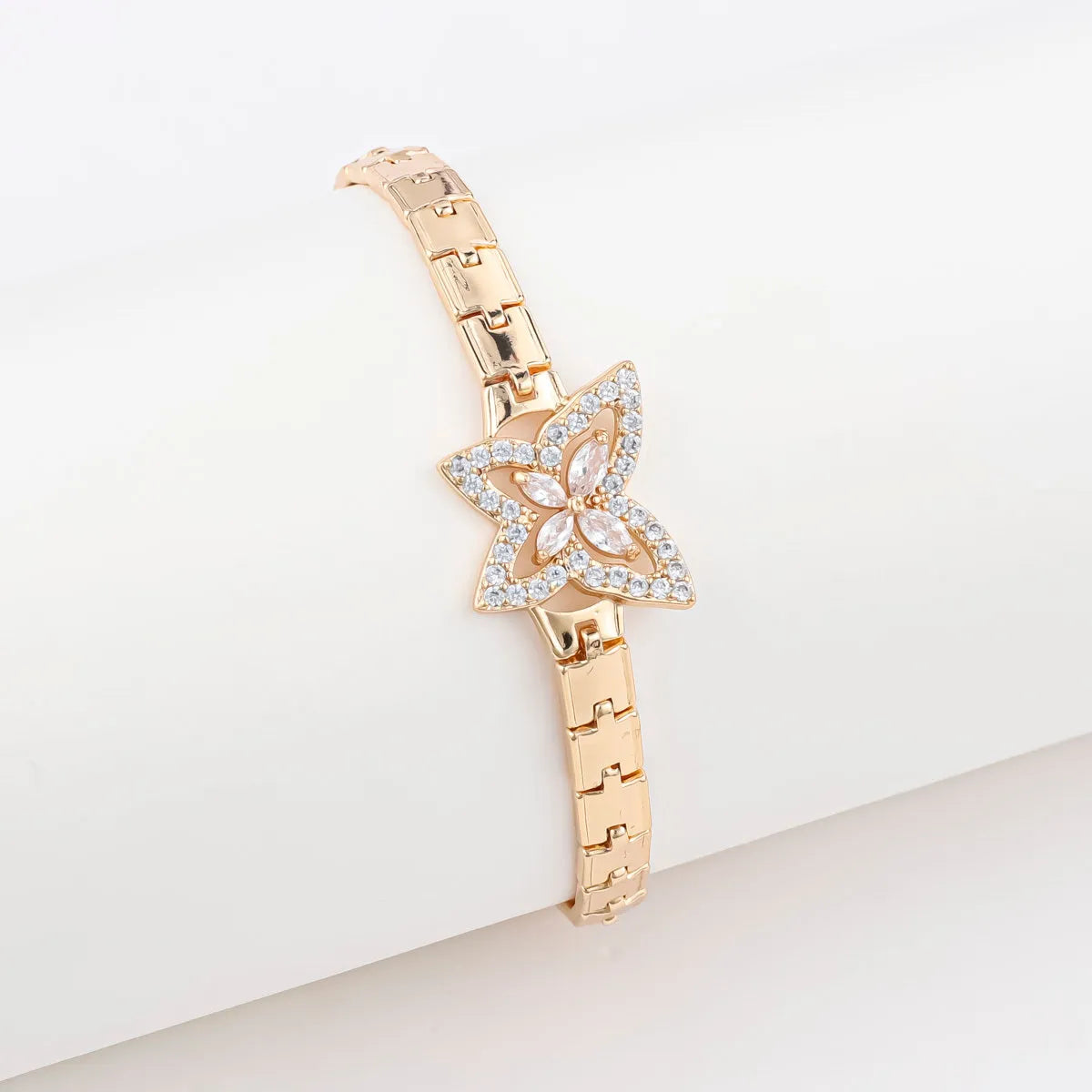 18K gold-plated butterfly clover bracelet with zircon stones on women's wrist