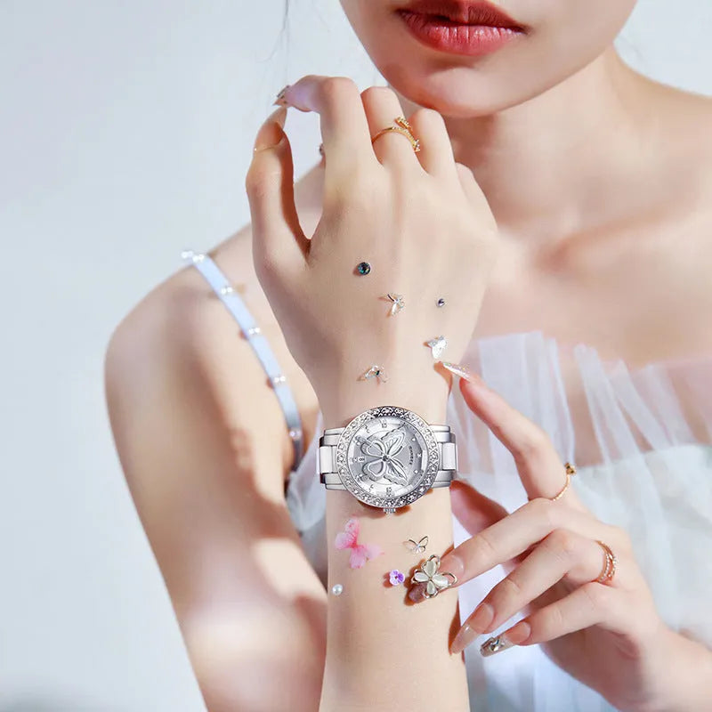 Butterfly diamond-encrusted women's watch with calendar and steel strap in pink dial