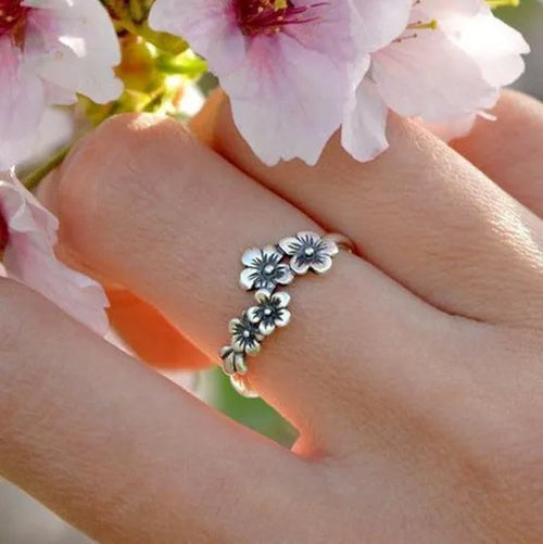 Antique silver alloy geometric ring with retro personality style on white background
