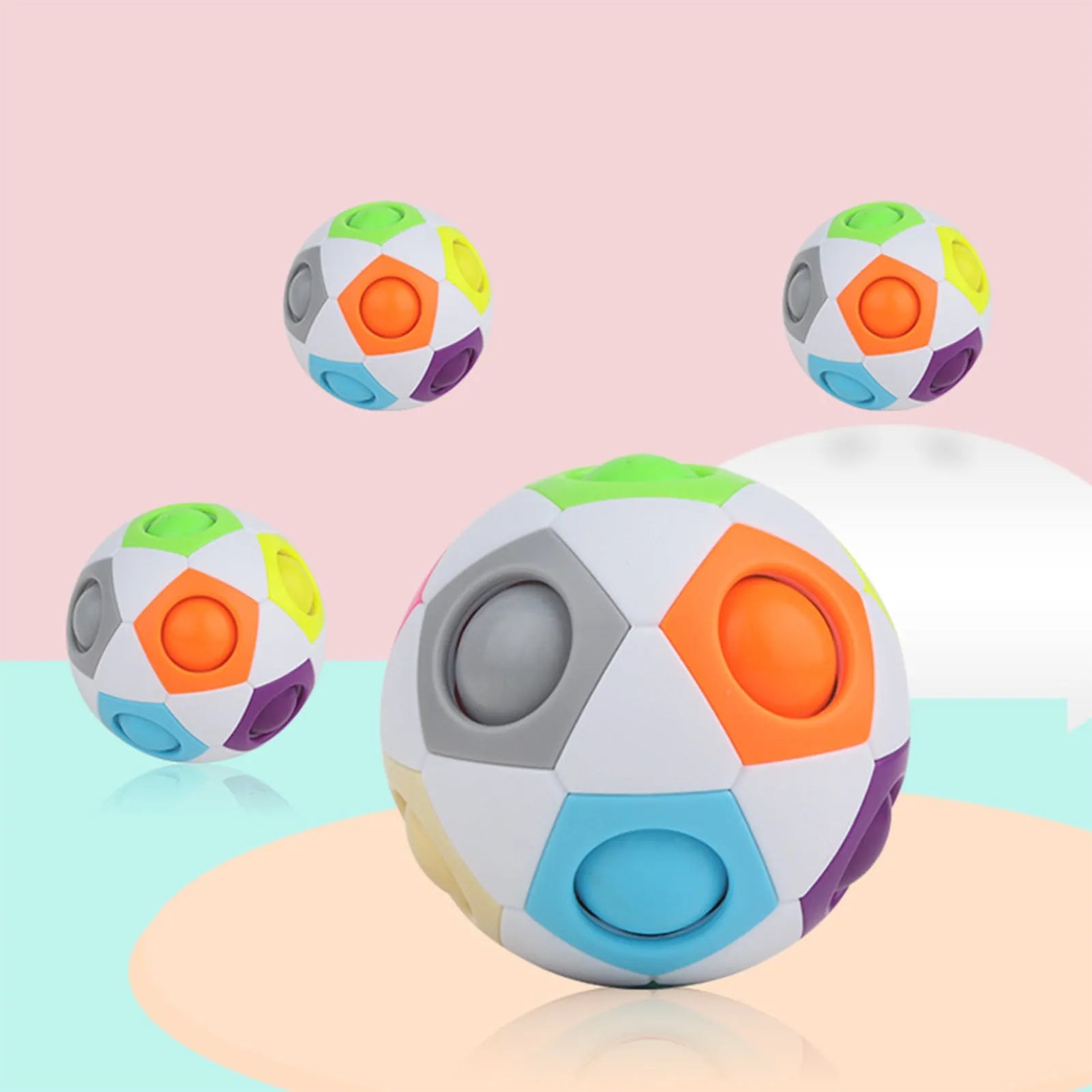 Rainbow coloured ball puzzle toy with multiple holes showing movable coloured balls inside plastic sphere