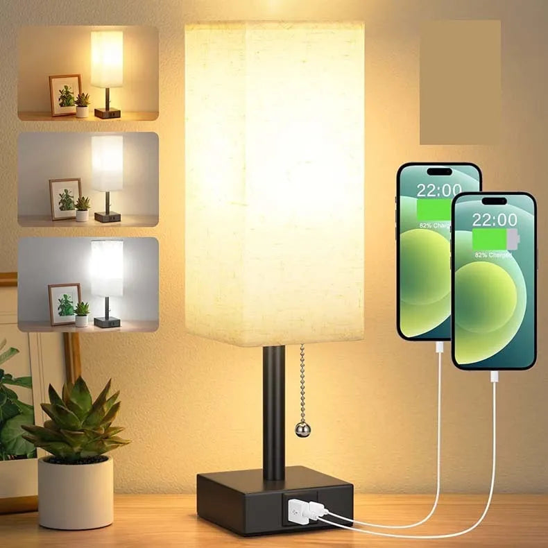 Small bedside table lamp with fabric shade and USB charging ports on a nightstand with pull chain control