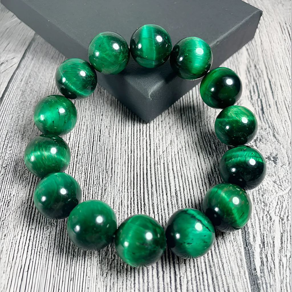 Green Tiger Eye stone bracelet with polished geometric beads in various sizes