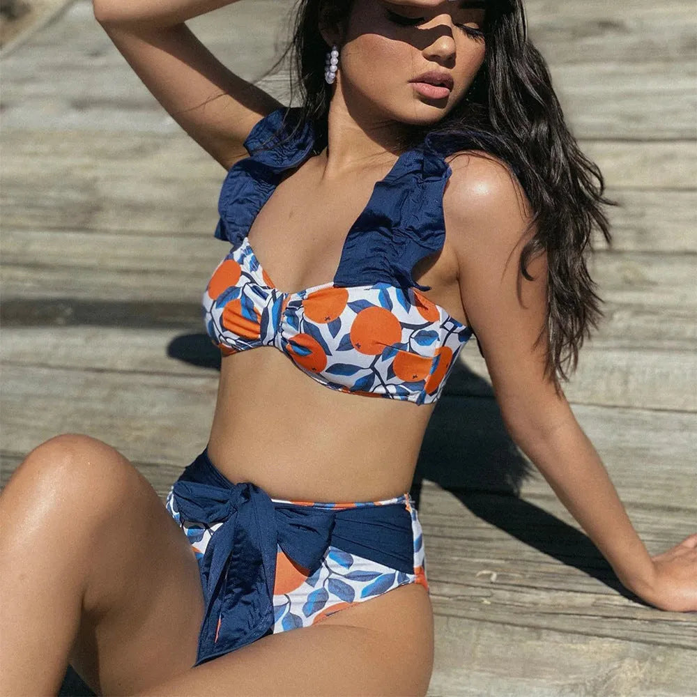 Women's blue leaves orange printed high waist bikini swimsuit with briefs style and sleeveless design