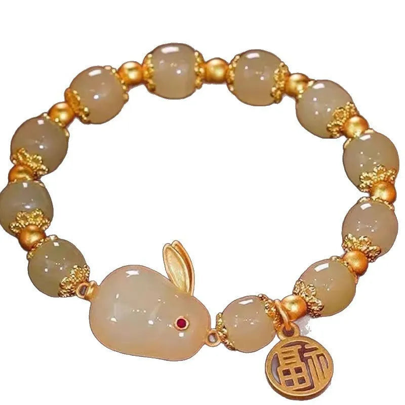 Handcrafted glass and coloured glaze bracelet with rabbit charm in national style design