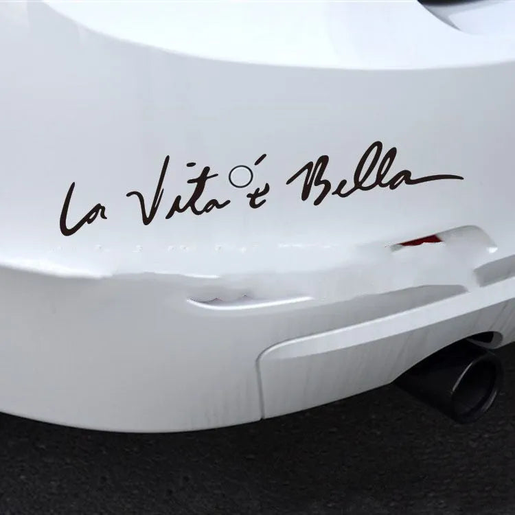 La E Bella reflective car sticker in black, 40x8cm, placed on a car door panel