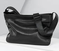 Men's black genuine leather and cowhide crossbody messenger bag with waterproof function and patchwork detail.