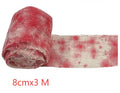 Roll of 8cm wide bloody red Halloween bandage gauze for horror decoration next to a white variant.