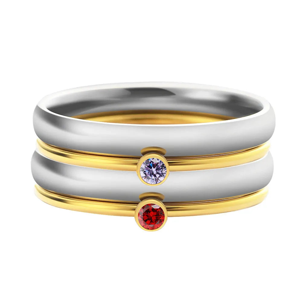 December birthstone titanium steel ring with engraved geometric design and gold tone finish.