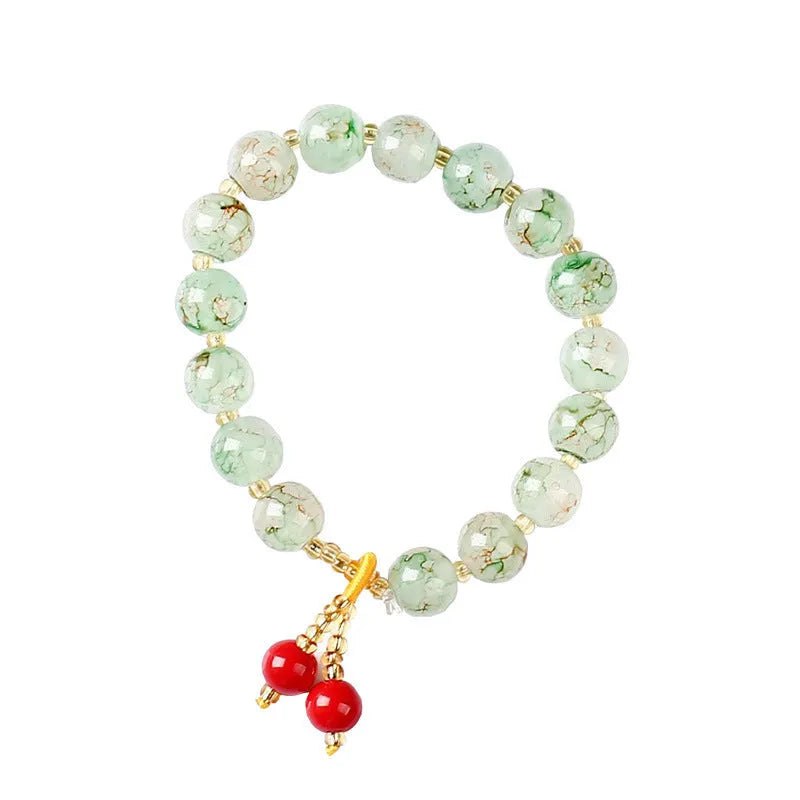Women's ceramic woven bracelet with geometric crystal beads in five colours: brown, green, light blue, pink, purple