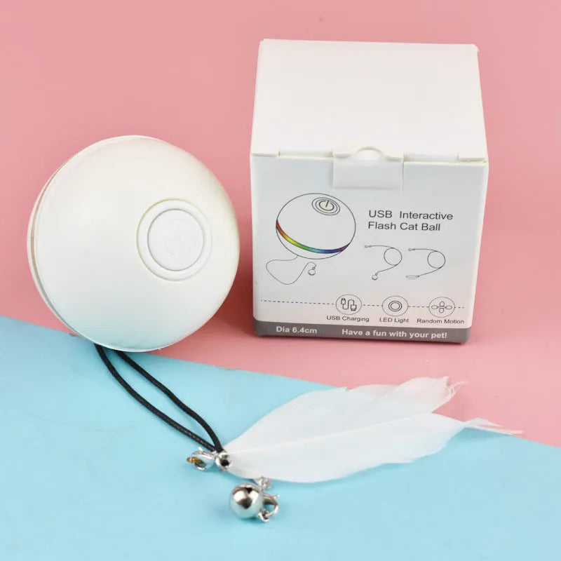 Pink USB rechargeable electric cat toy ball with LED light and feather attachment