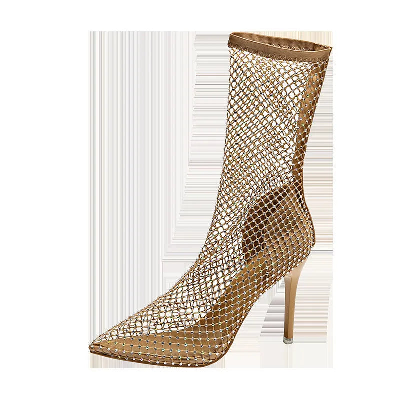 Gold high heel sandals with pointed stiletto heels and mesh upper
