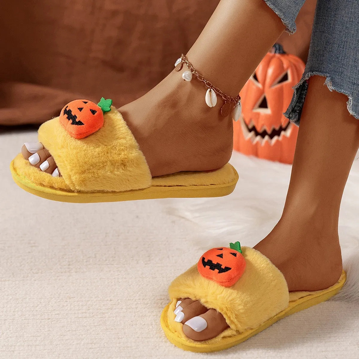Halloween pumpkin plush slippers with cartoon design on synthetic fur upper, open toe style