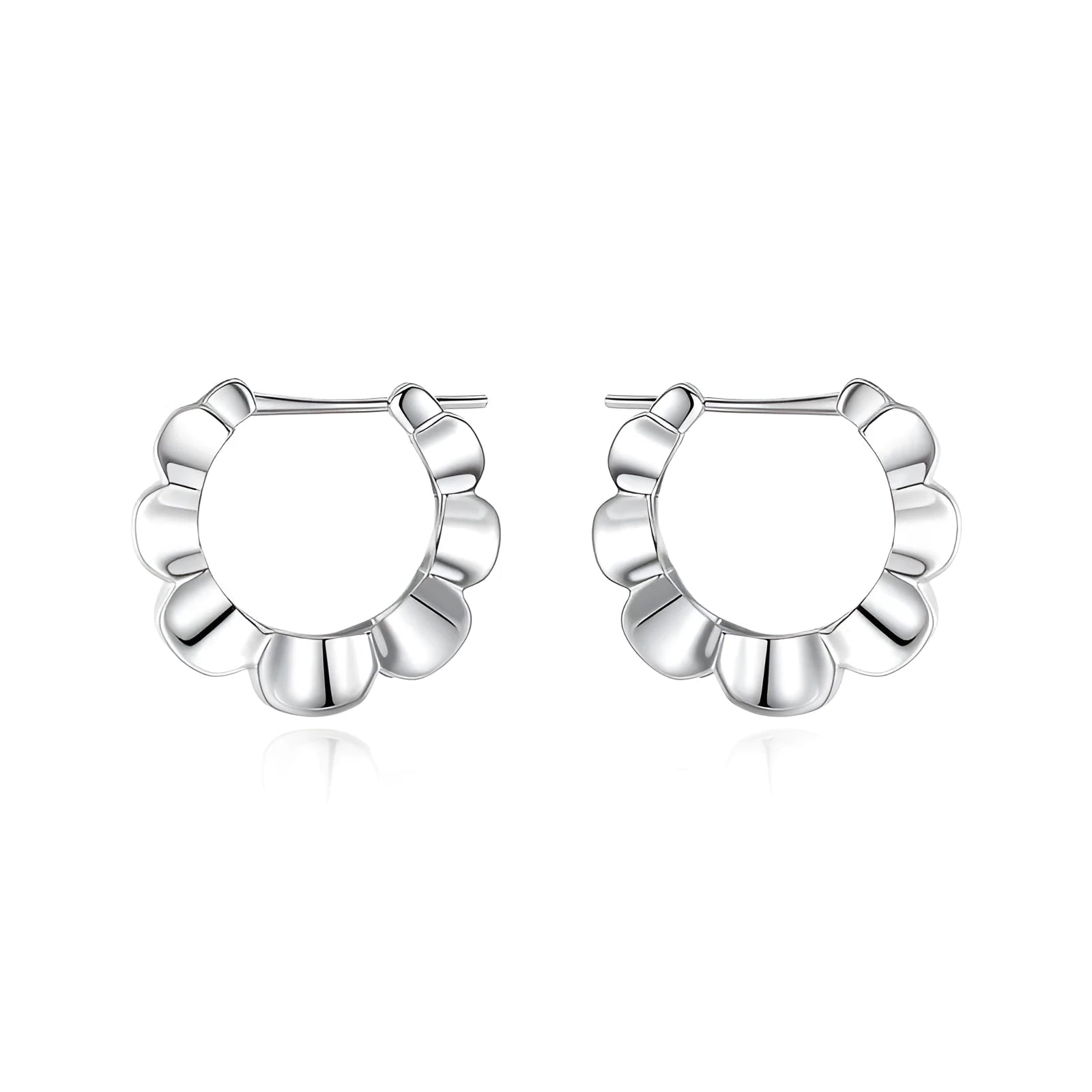 A pair of sterling silver geometric earrings with round accents on a white background.