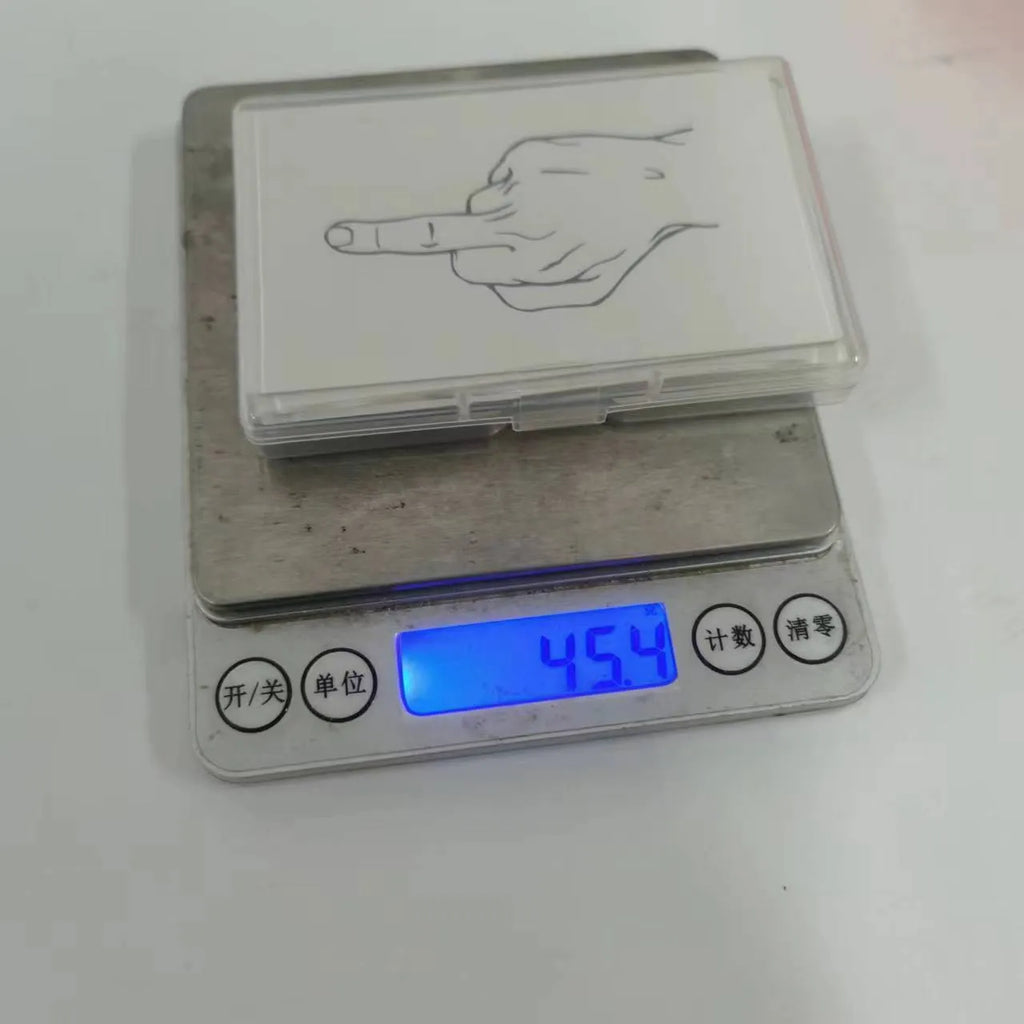 Box of paper illegal parking reminder cards featuring a printed middle finger design.