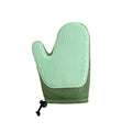 Dark blue mesh pet hair removal glove for grooming cats and dogs on a hand.