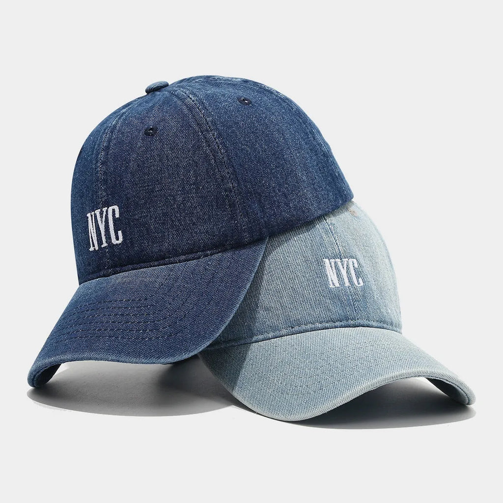 Retro denim peaked baseball cap with an alphabet letter, shown in light blue, dark blue, and black colours.
