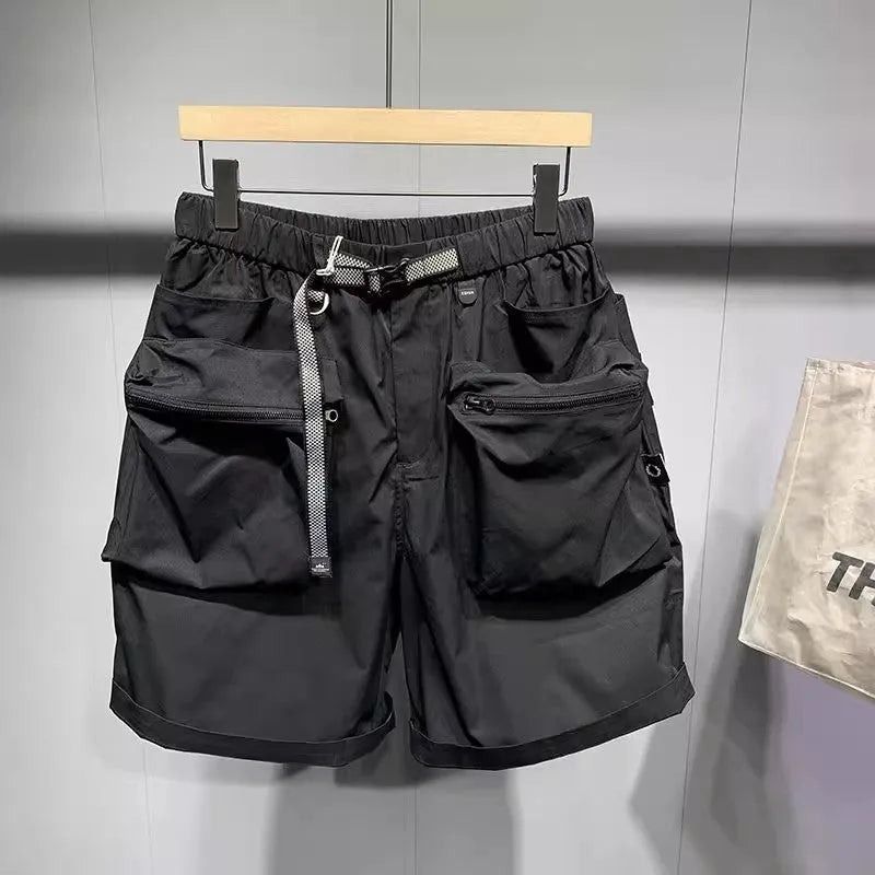Large size men's work shorts in black with multiple pockets and straight leg design