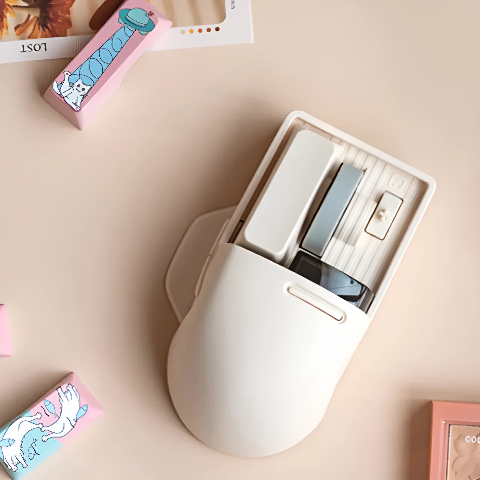 Xiaoqiao tofu-coloured wireless mouse with Type-C cable and USB receiver on a desk.