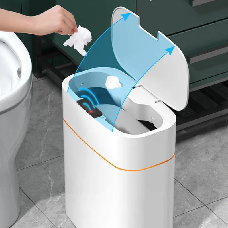 White automatic smart trash can with sensor lid on a kitchen floor.