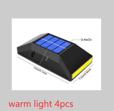 Solar-powered outdoor wall light with six LEDs mounted on a fence post