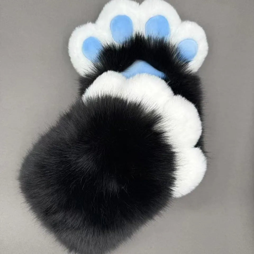 Nylon animal claw cosplay gloves showing coloured pads on fingertips in a black and blue colour combination