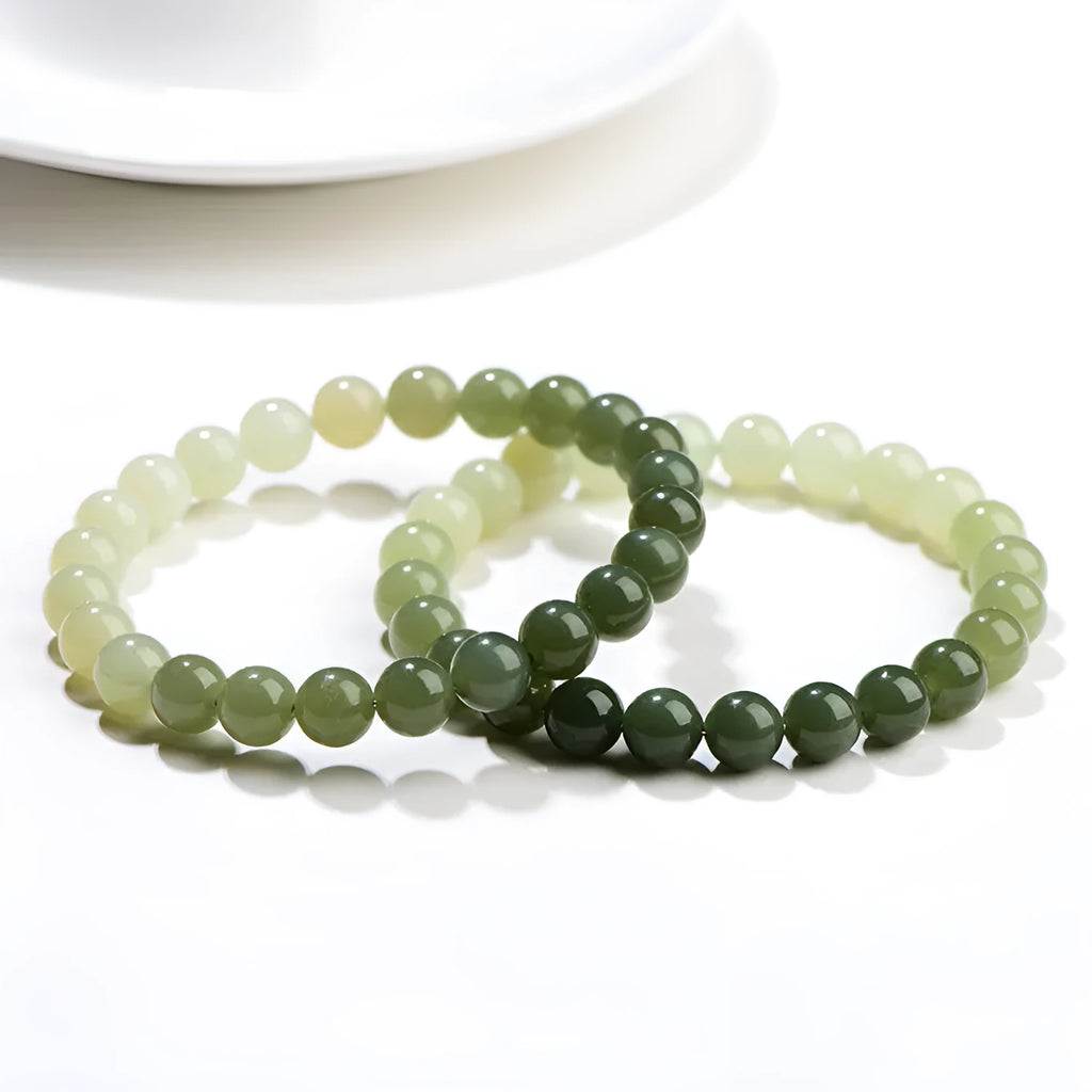 Natural clear water Hetian jade bracelet with gradient colour round or barrel beads