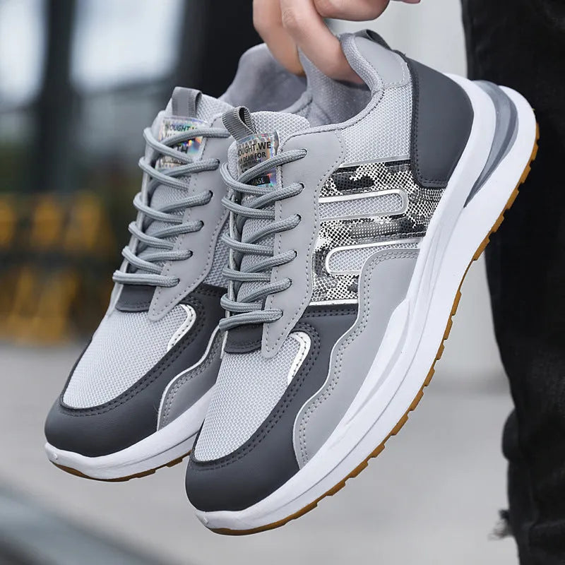 Men's plus size mesh casual shoe with leather toe holder in grey, white green, or black.