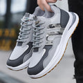 Men's plus size mesh casual shoe with leather toe holder in grey, white green, or black.