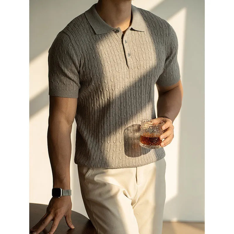 Men's short sleeve business top in khaki colour, shown on a hanger.
