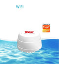 White WiFi smart leakage alarm with buzzer placed on a floor for water overflow detection