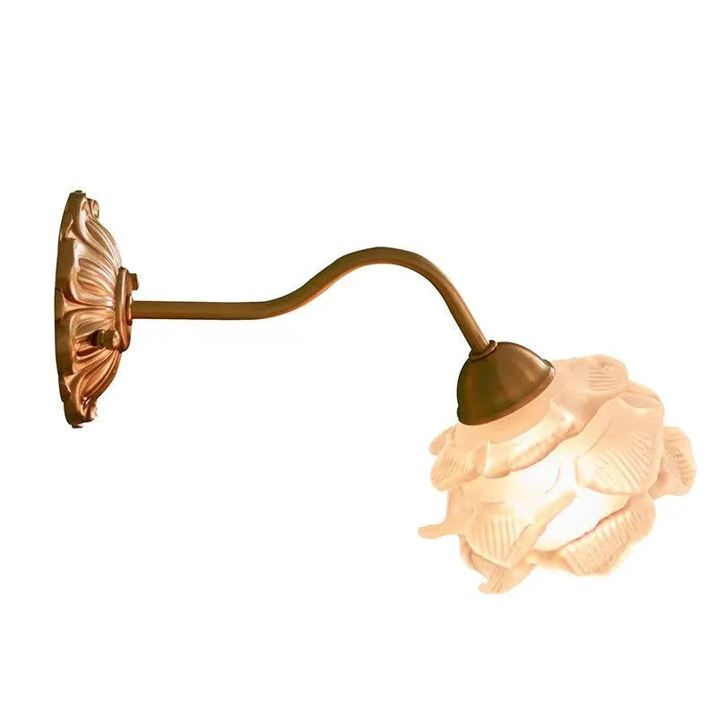 Retro copper wall lamp with frosted glass shade and warm LED light mounted on a bedroom wall