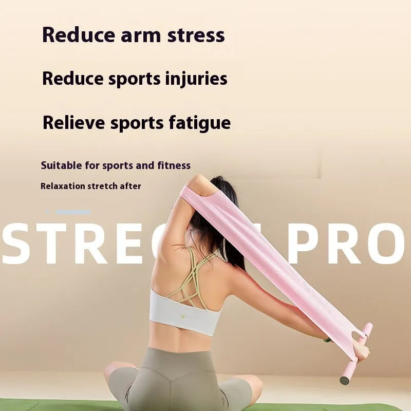Grey and pink yoga multi-function stretching tool for shoulder, back, and hip flexibility on a plain background.