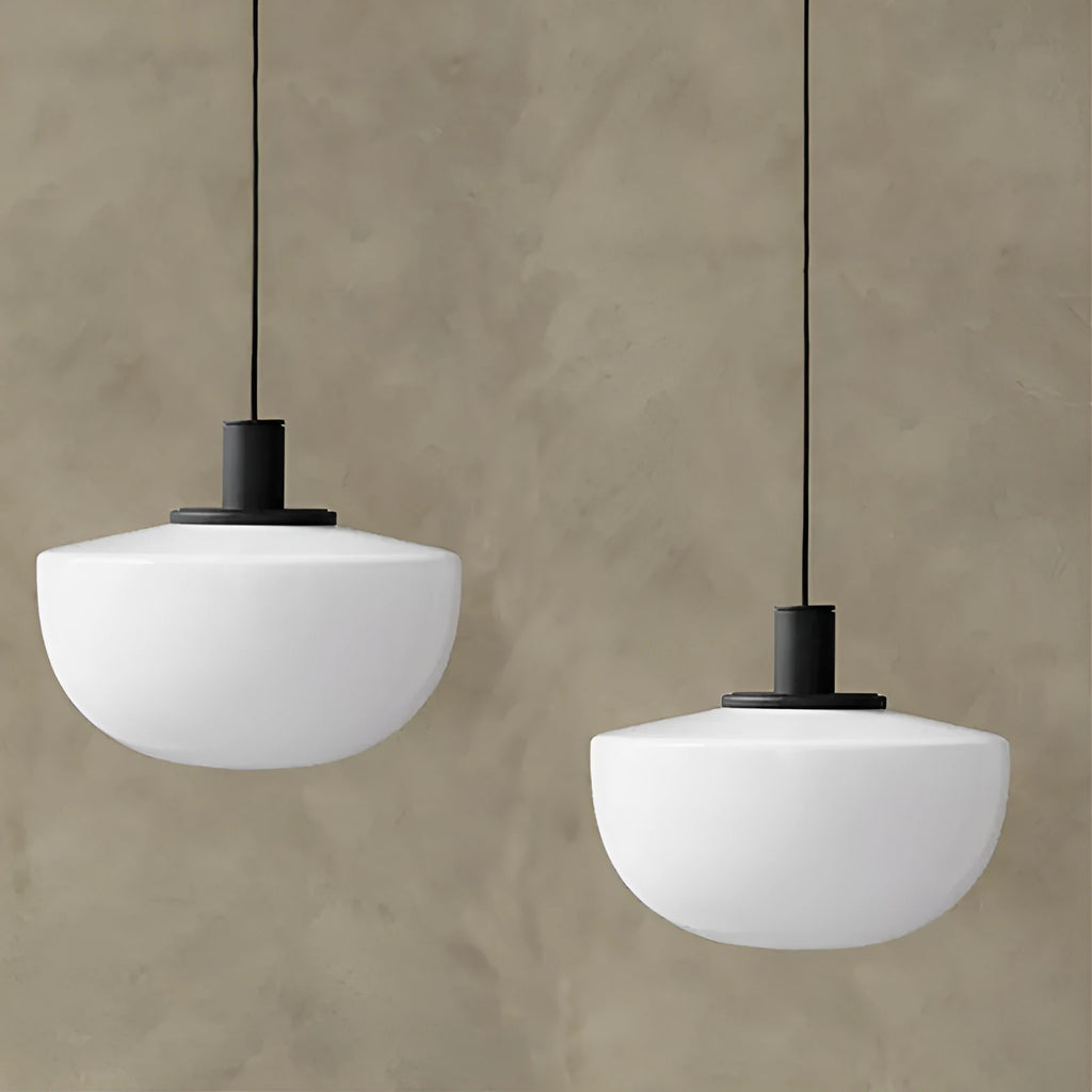 Simple modern glass pendant light with single-head droplight design in milky white finish
