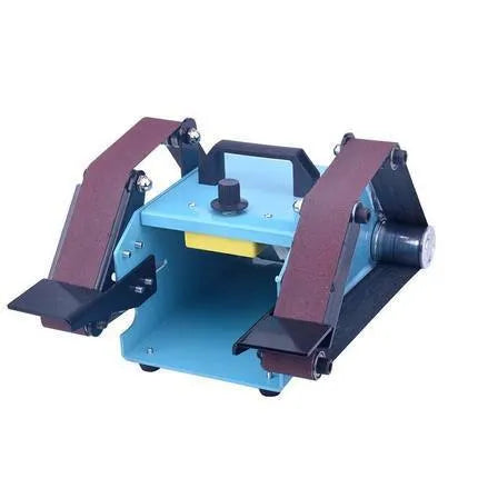 Blue desktop belt sander with variable speed control for sharpening knives and tools on a workbench.