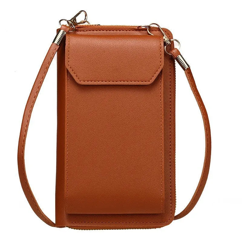 Mini crossbody phone bag for women in black PU leather with adjustable strap and sewing thread detail.