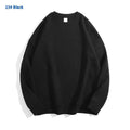 Women's loose black cotton off-the-shoulder sweater pullover with long sleeves.