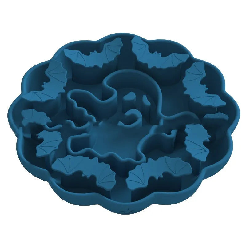 Silicone dog slow feeder bowl in a hexagonal shape on a floor, showing textured surface for slowing eating pace.